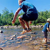 students playing in the water