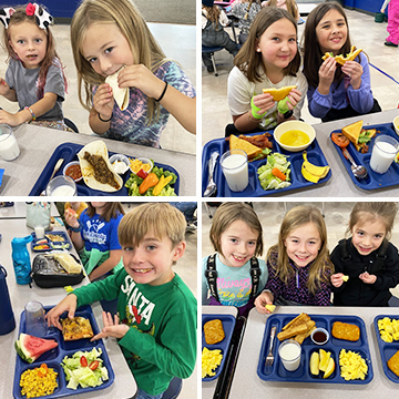 three students eating school lunch, lunch worker holding a tray with school lunch